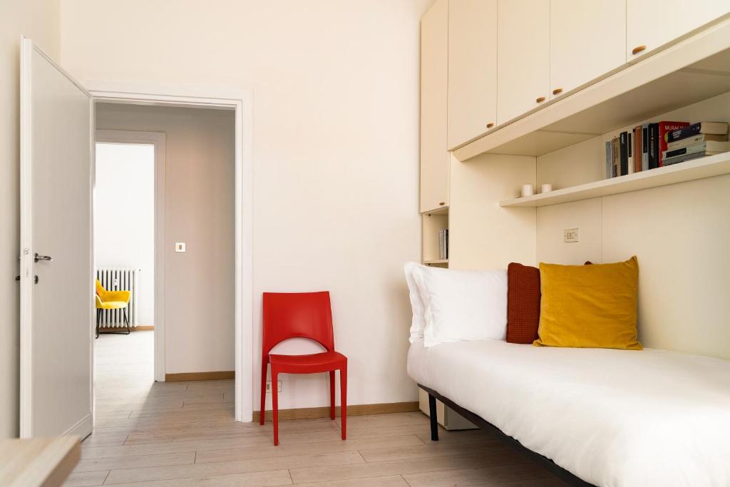 A bed or beds in a room at Accomodo MIT12 Trivano Linate