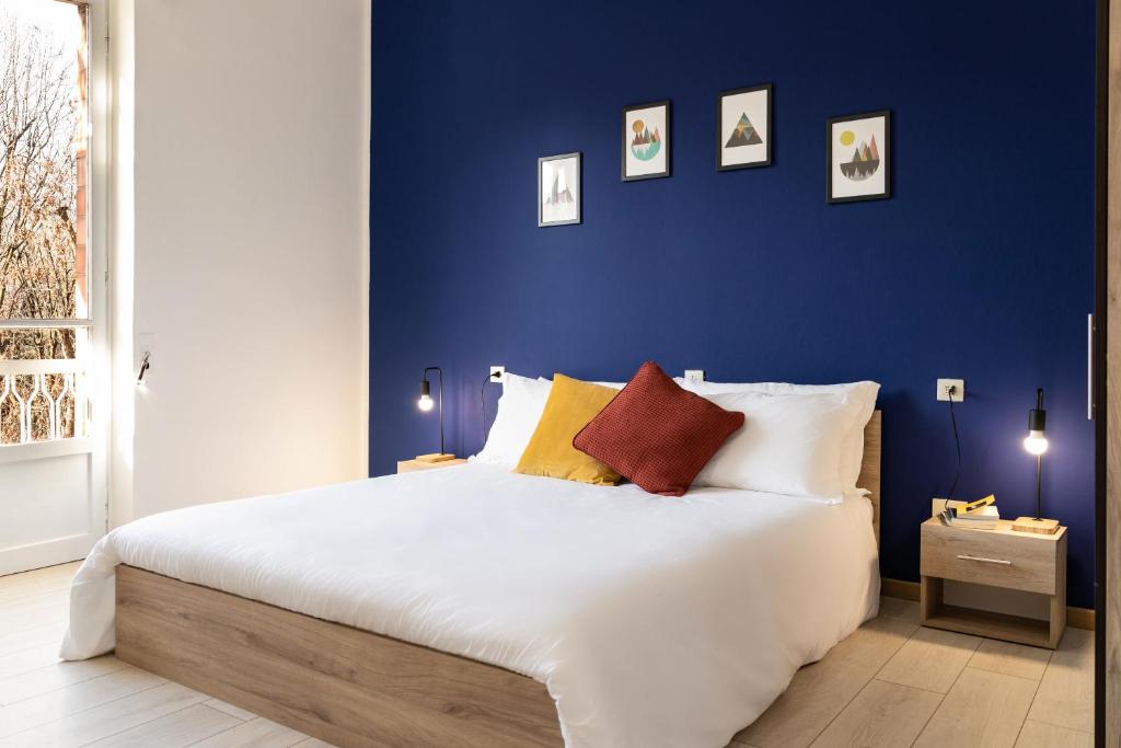 A bed or beds in a room at Accomodo MIT12 Trivano Linate