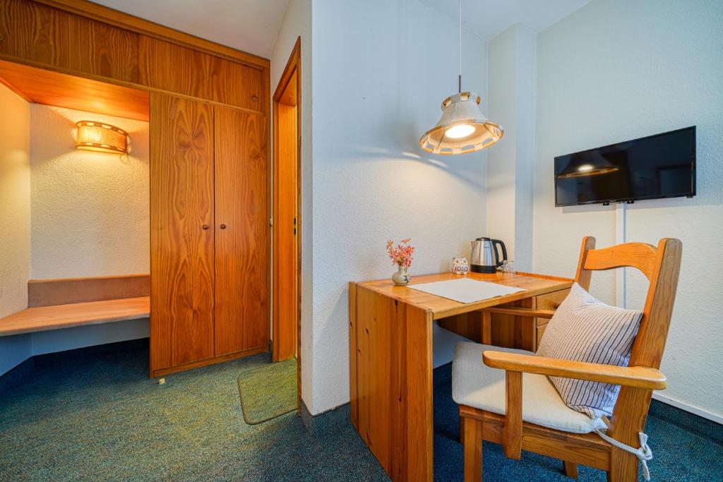 Postel nebo postele na pokoji v ubytování Hotel Zur Eule