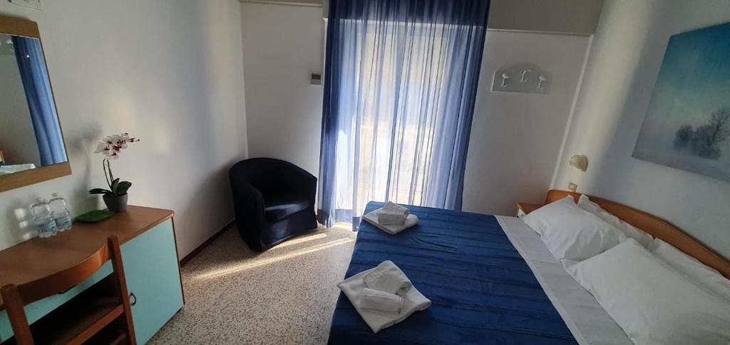 Postel nebo postele na pokoji v ubytování Hotel Franca