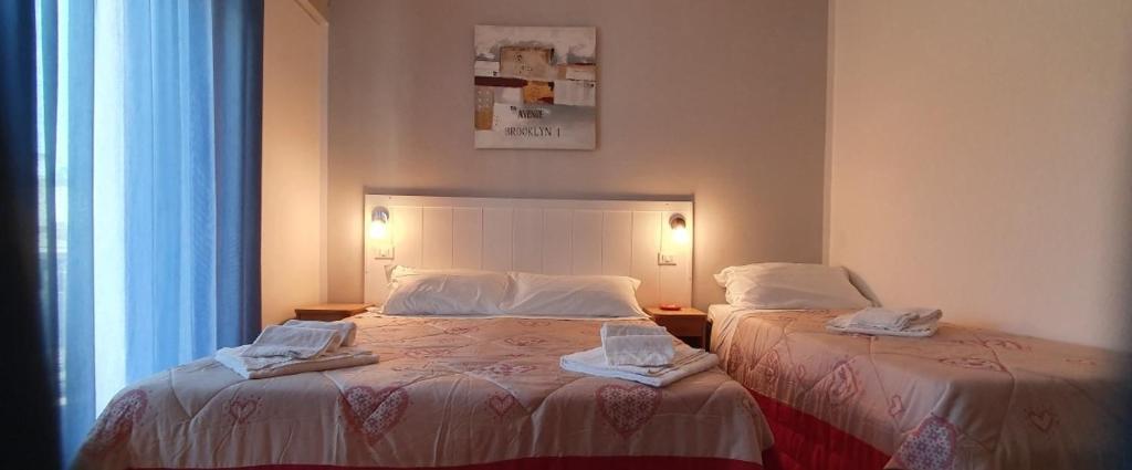 Postel nebo postele na pokoji v ubytování Hotel Franca