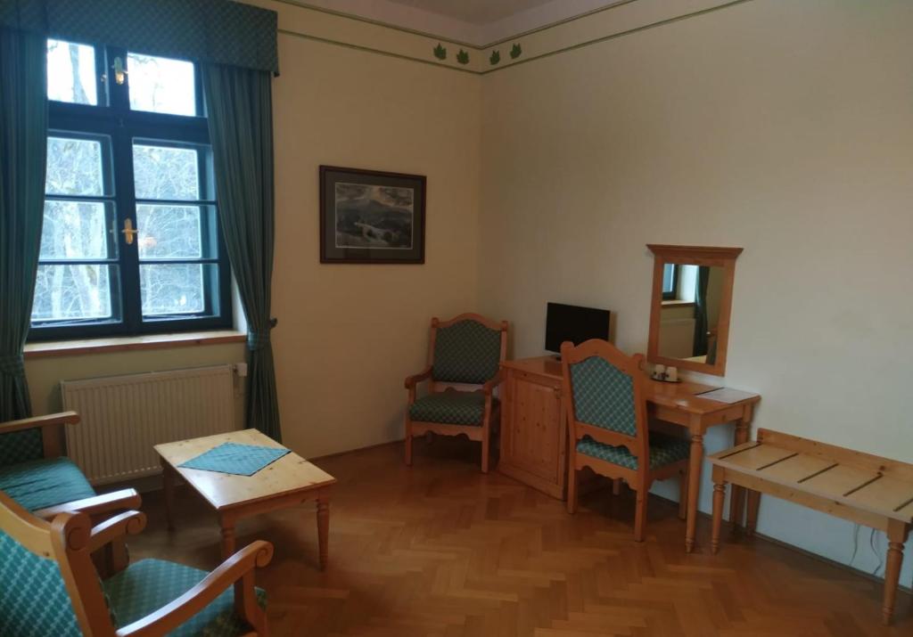 TV a/nebo společenská místnost v ubytování Hotel Svatý Tomáš