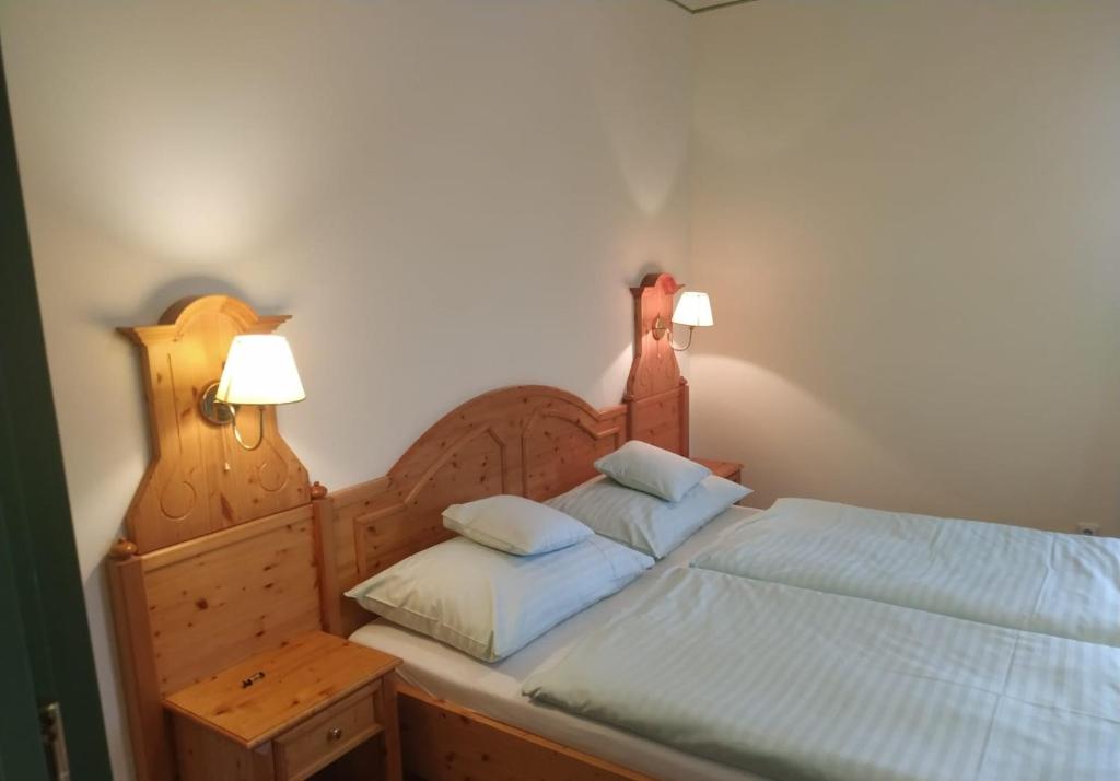 Postel nebo postele na pokoji v ubytování Hotel Svatý Tomáš