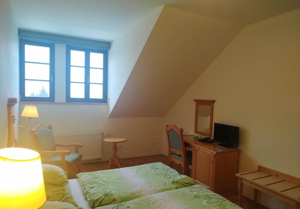 TV a/nebo společenská místnost v ubytování Hotel Svatý Tomáš