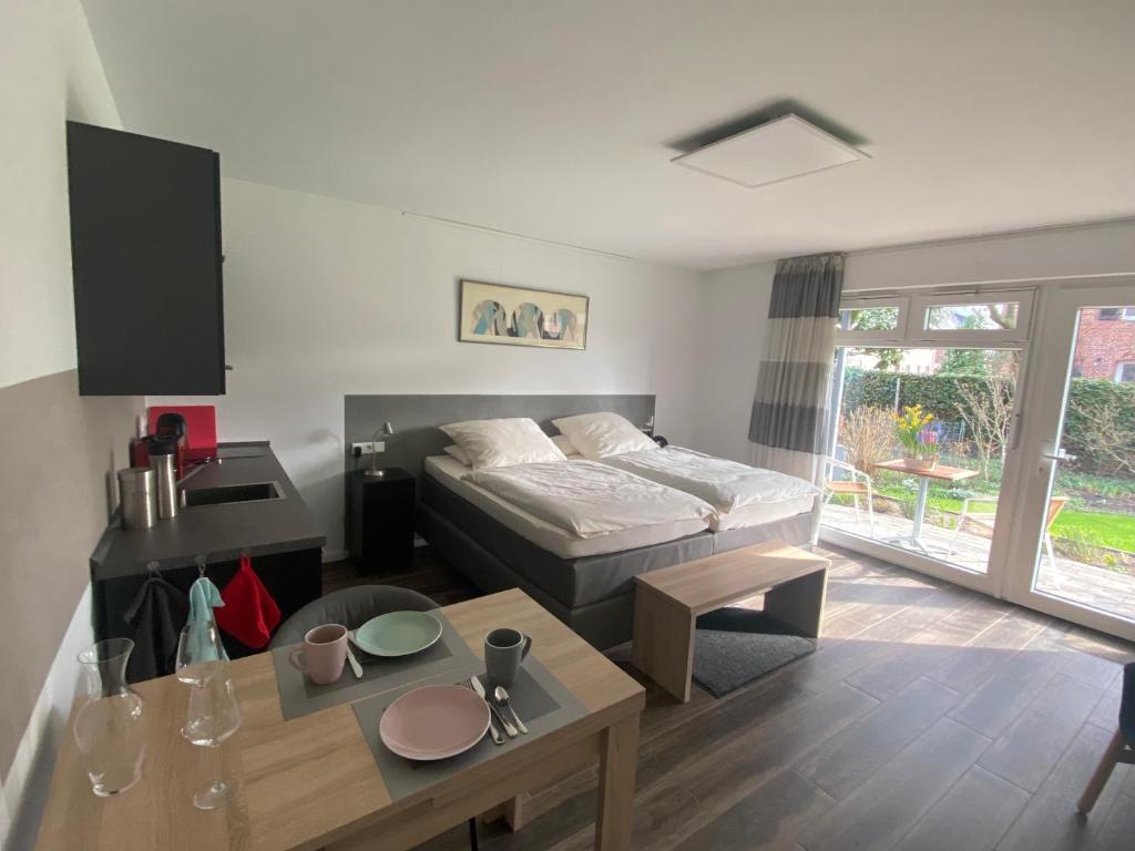 Ένα ή περισσότερα κρεβάτια σε δωμάτιο στο Komfort-Apartment BIRKE