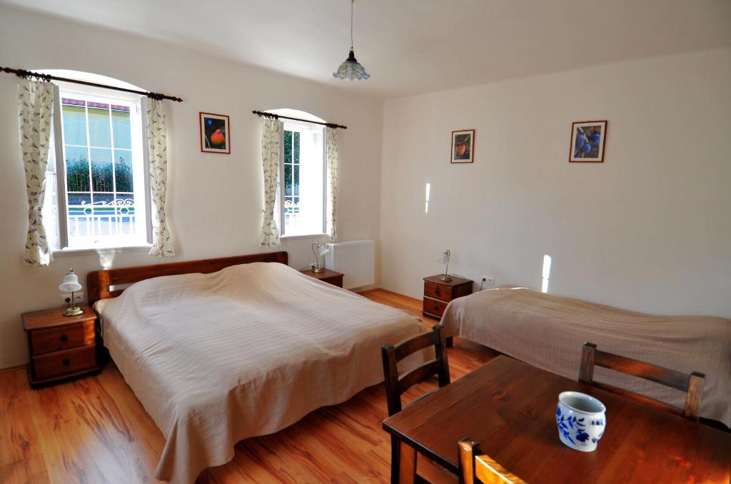 Postel nebo postele na pokoji v ubytování Kis-Balatoni Ökoporta