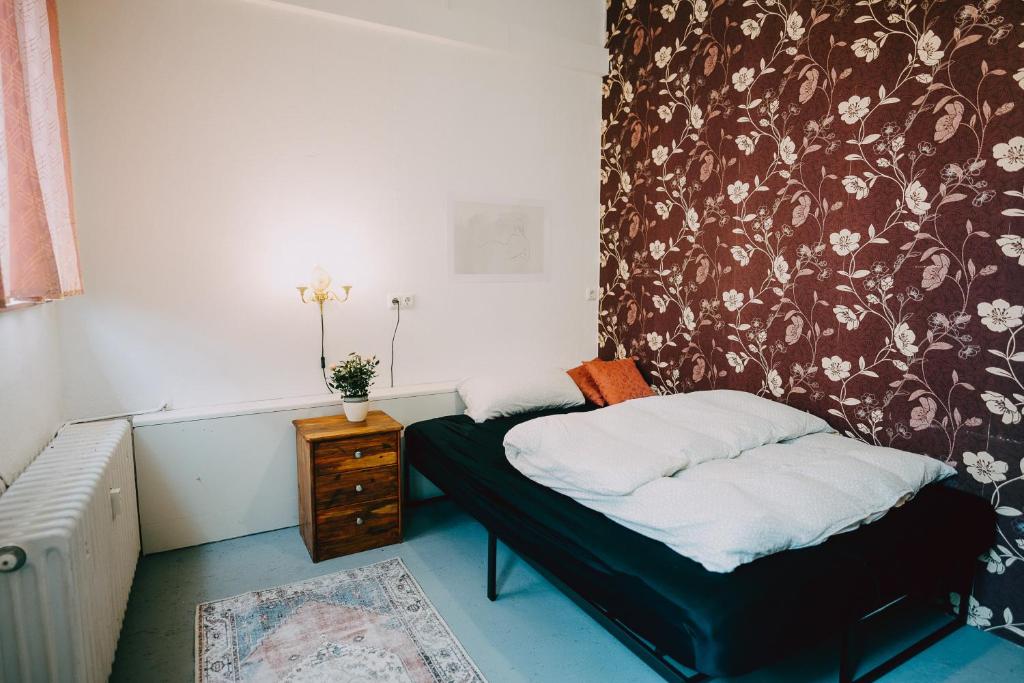 Postel nebo postele na pokoji v ubytování Hostel Très Schick