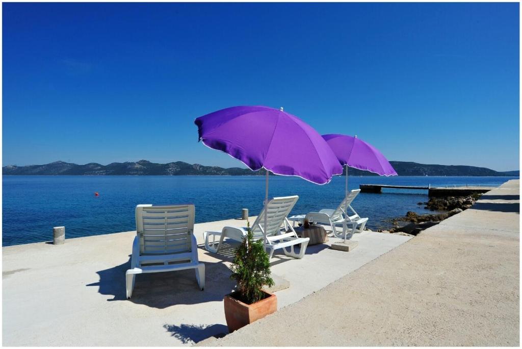 Fotografia z galérie ubytovania First row next to sea apartments with infinity jacuzzi v destinácii Mali Iž