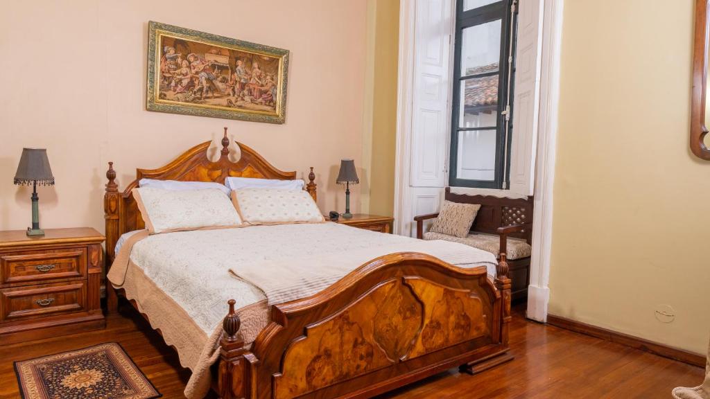 Postel nebo postele na pokoji v ubytování Casa Colonial Quito