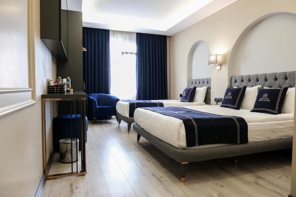 Cama ou camas em um quarto em Plus Hotel & Private Transportation İstanbul Airport-By Loft