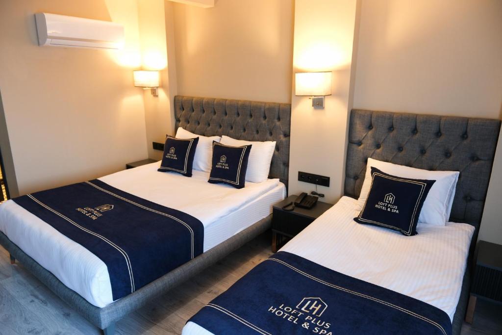 Cama ou camas em um quarto em Plus Hotel & Private Transportation İstanbul Airport-By Loft