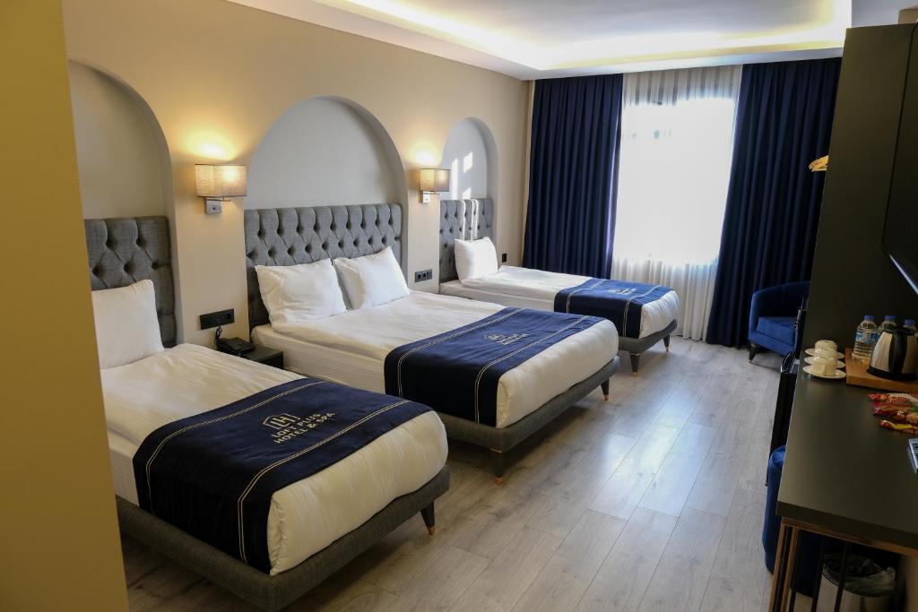 Cama ou camas em um quarto em Plus Hotel & Private Transportation İstanbul Airport-By Loft