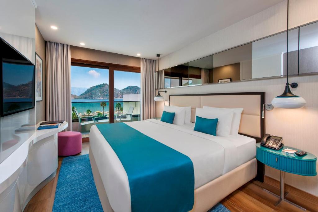 Postel nebo postele na pokoji v ubytování Elite World Marmaris - Adult Only