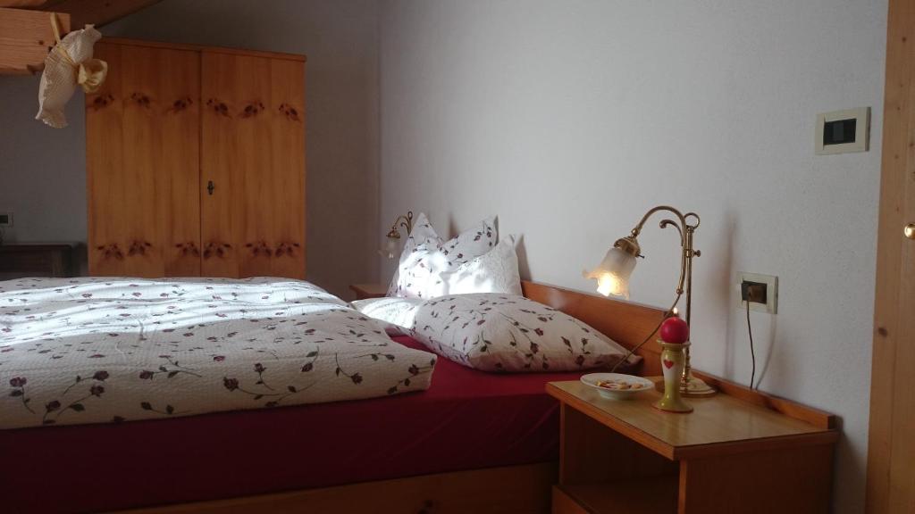 Postel nebo postele na pokoji v ubytování B&B Casa Riz