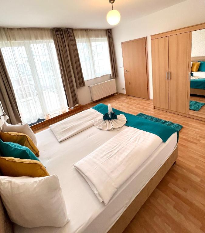 Posteľ alebo postele v izbe v ubytovaní Nova Apartments