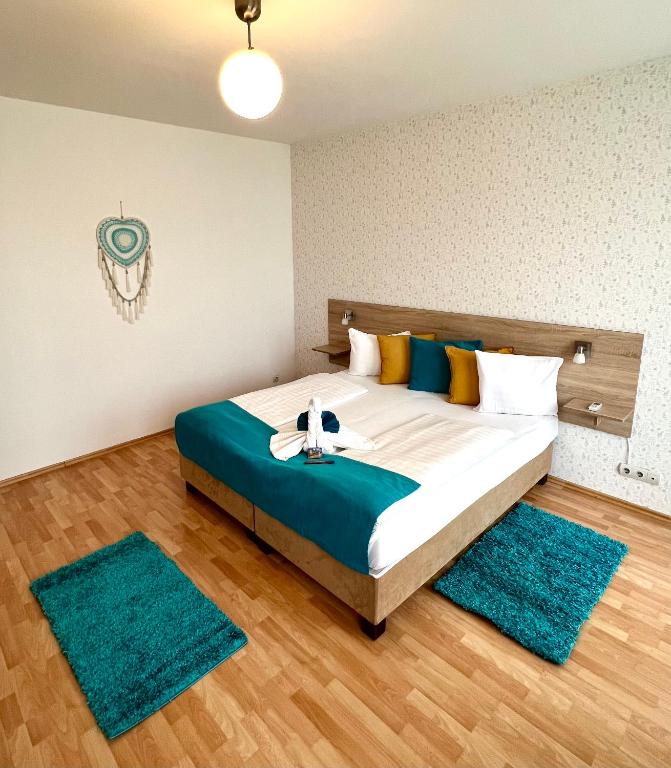 Posteľ alebo postele v izbe v ubytovaní Nova Apartments