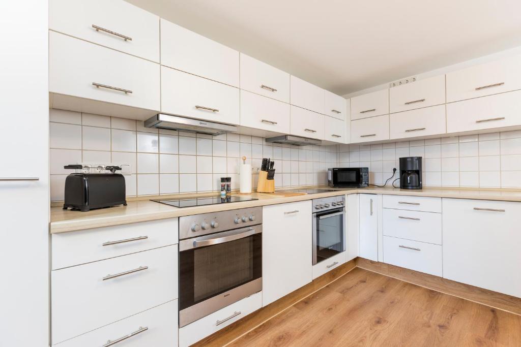 Kuchyň nebo kuchyňský kout v ubytování mk monteurzimmer eschborn