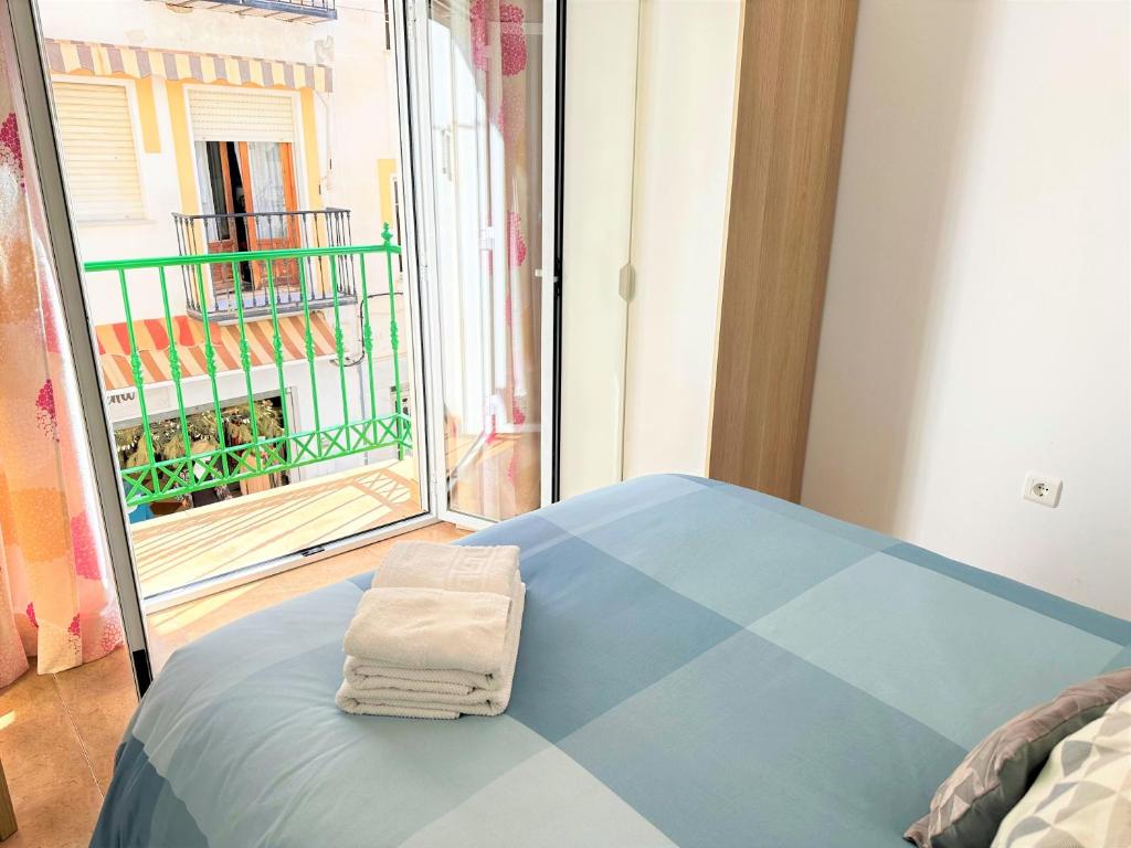 Łóżko lub łóżka w pokoju w obiekcie Casa Jazmi­n