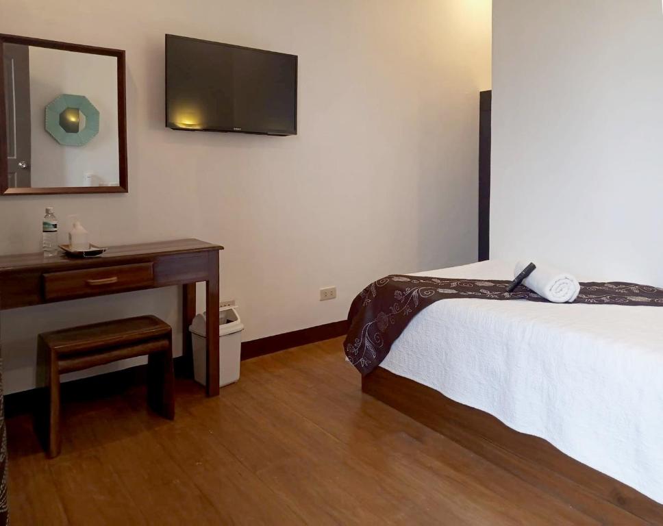Postel nebo postele na pokoji v ubytování Balaibinda Lodge