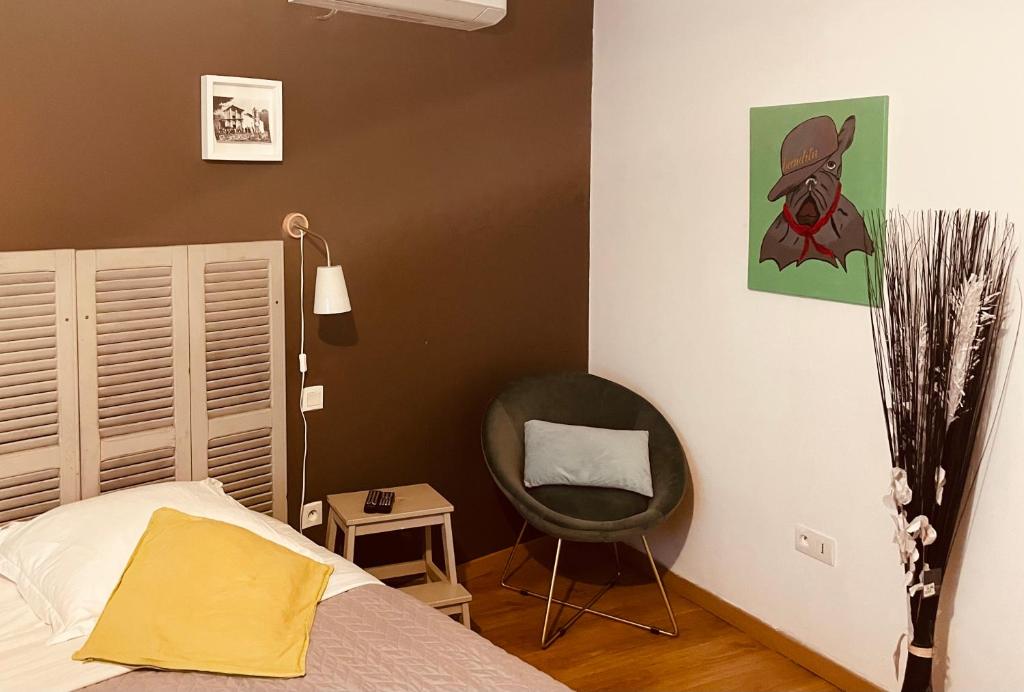 Postel nebo postele na pokoji v ubytování Hôtel U Passa Tempu