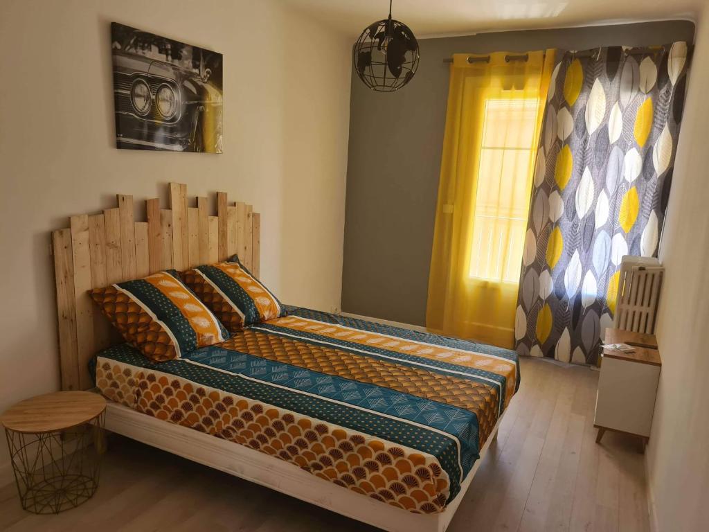 Posteľ alebo postele v izbe v ubytovaní Mireio Arles centre climatisé 1 à 6 personnes Appartement