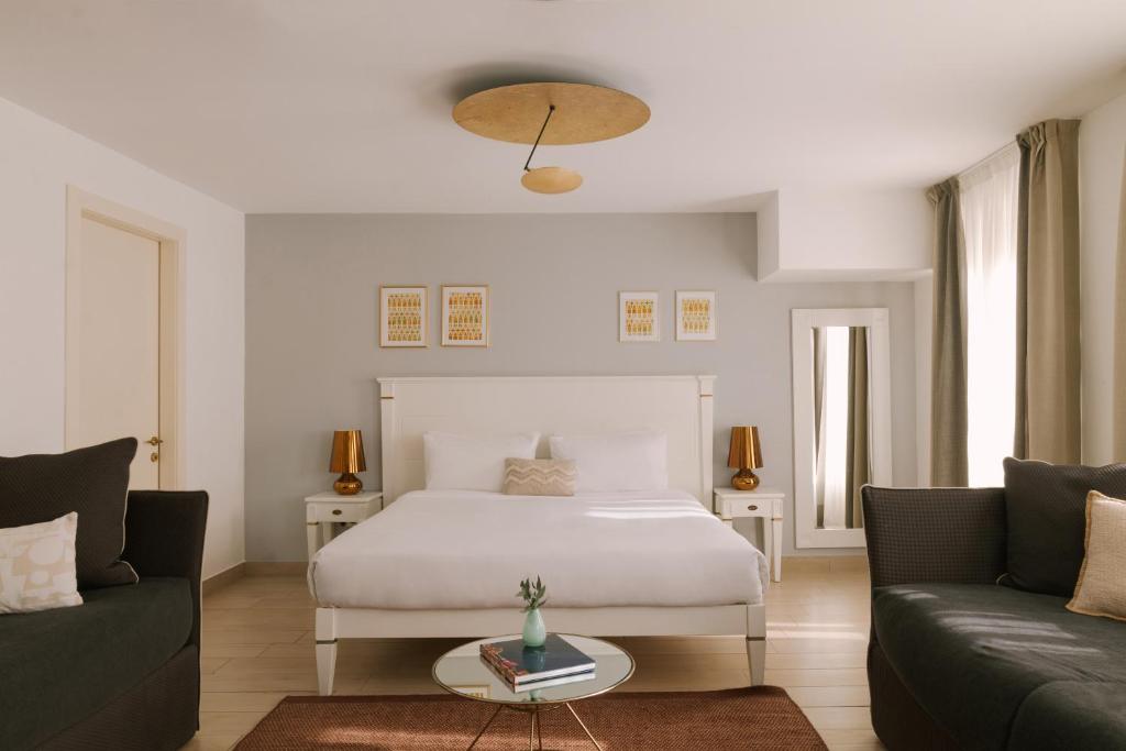Postel nebo postele na pokoji v ubytování iH Hotels Venezia Salute Palace