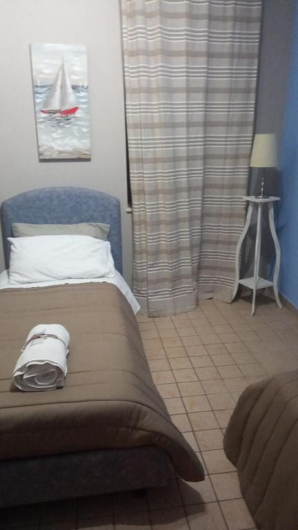 Postel nebo postele na pokoji v ubytování Scorcio Di Mare