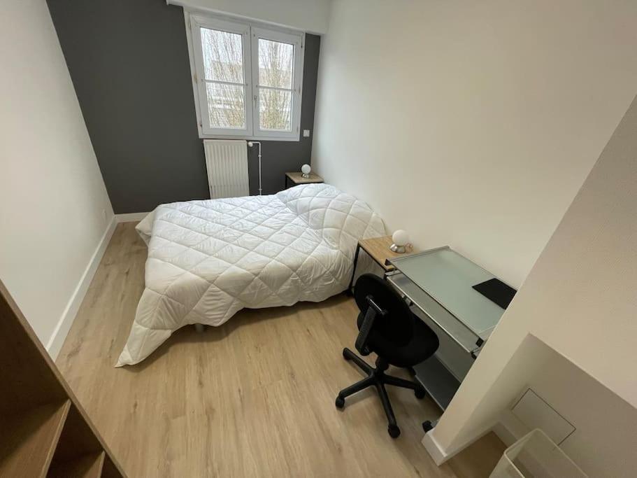 Posteľ alebo postele v izbe v ubytovaní Urban flat au cœur de Lorient