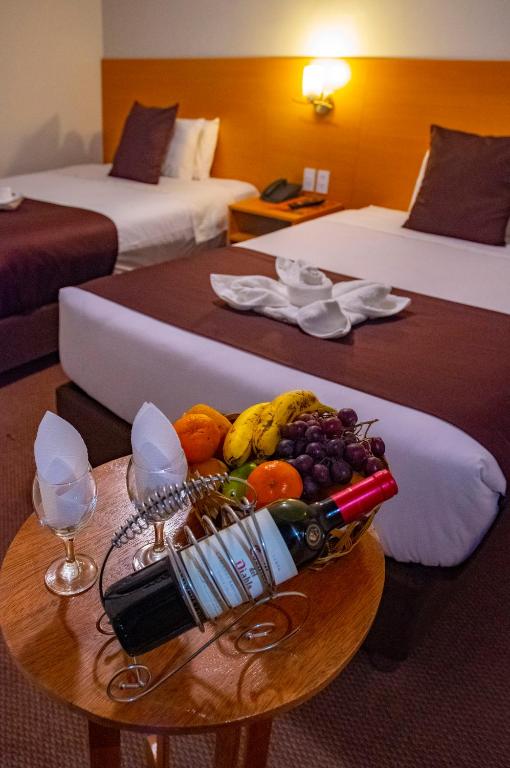 Postel nebo postele na pokoji v ubytování Casona Plaza Balsa Inn