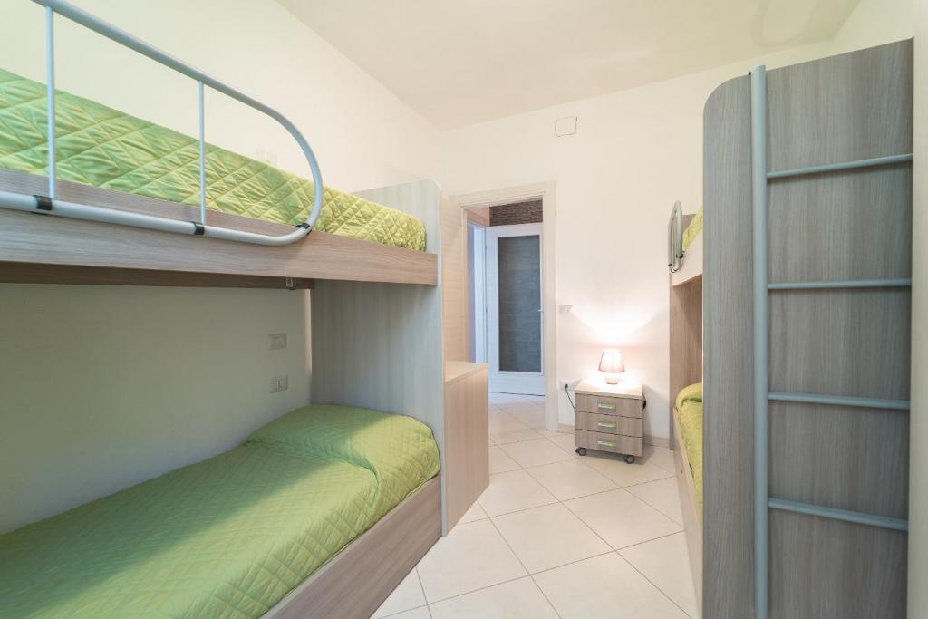 A bed or beds in a room at MIROS APARTMENT