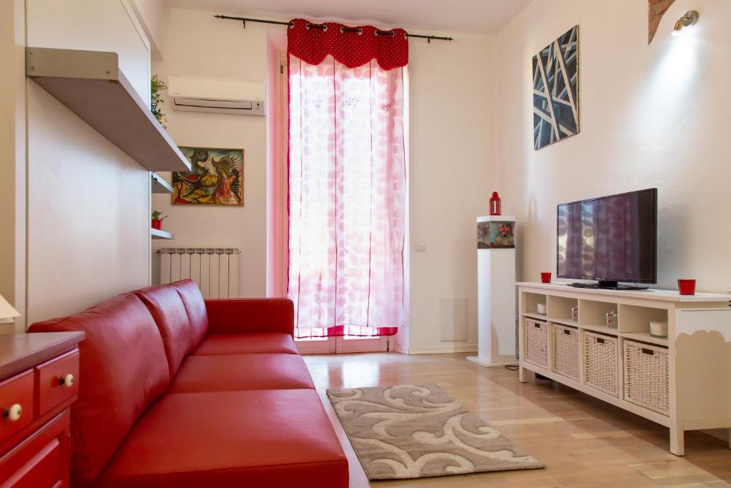 TV a/nebo společenská místnost v ubytování Red House - Florence
