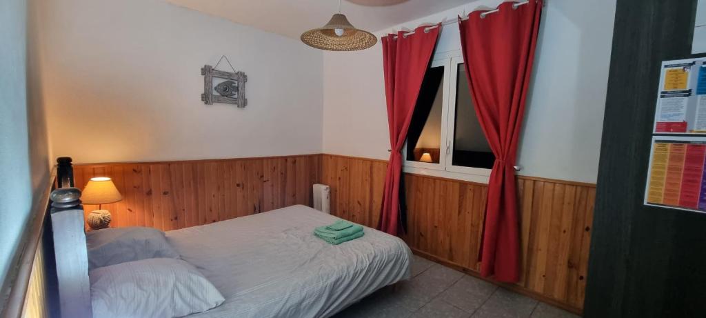 Postel nebo postele na pokoji v ubytování Case Tortue - chambres chez l'habitant - 3 étoiles