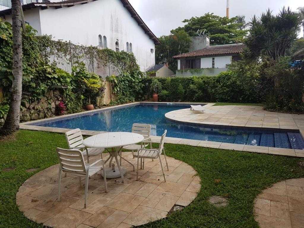 Πισίνα στο ή κοντά στο POUSADA VILLA DI GUARUJÁ