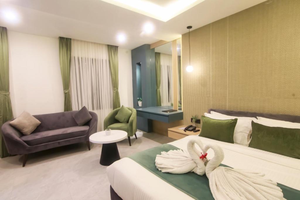 Postel nebo postele na pokoji v ubytování Hotel Aikawa