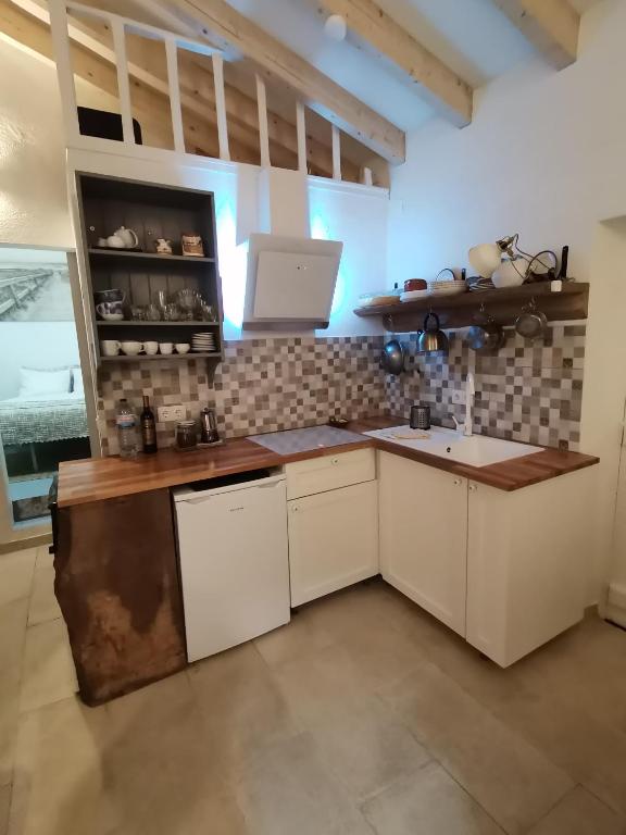 Kuchyň nebo kuchyňský kout v ubytování Chalé da Baía