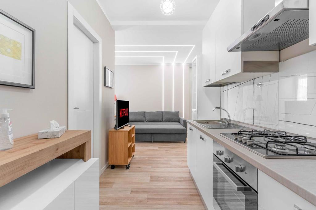 A kitchen or kitchenette at BO13 -Crescenzago- Bright - Wifi - Elegant