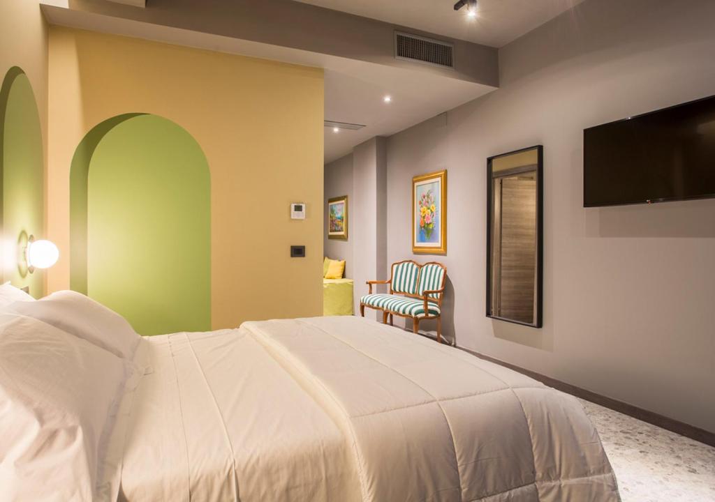 Postel nebo postele na pokoji v ubytování Corso Vittorio B&B