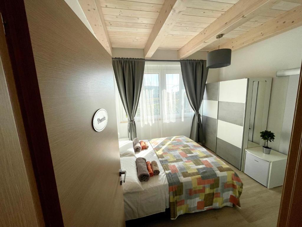 Un pat sau paturi într-o cameră la Palm House
