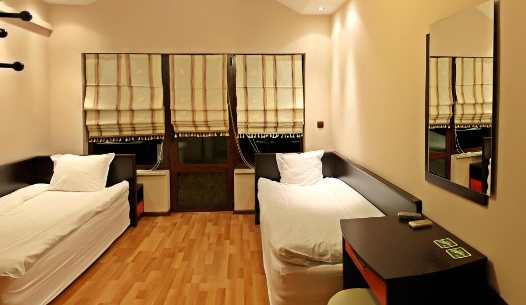 Postel nebo postele na pokoji v ubytování Hotel Berito