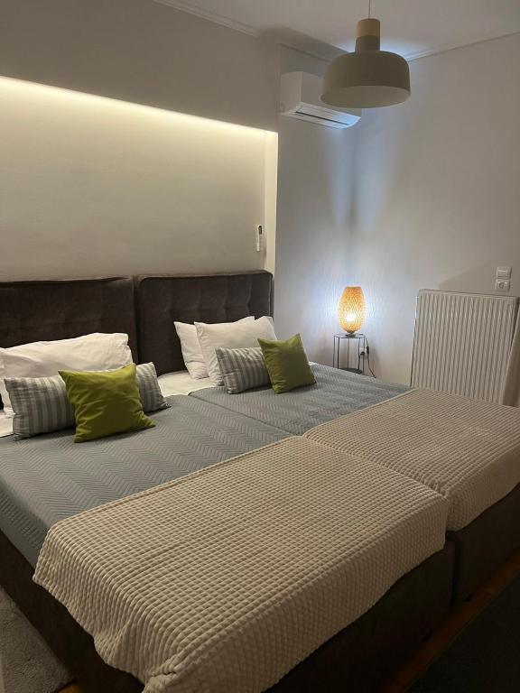 Postel nebo postele na pokoji v ubytování Marine Luxury Apartment Kalamata