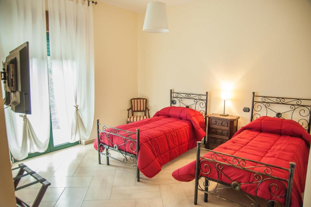 Postel nebo postele na pokoji v ubytování B&B La Cannalia