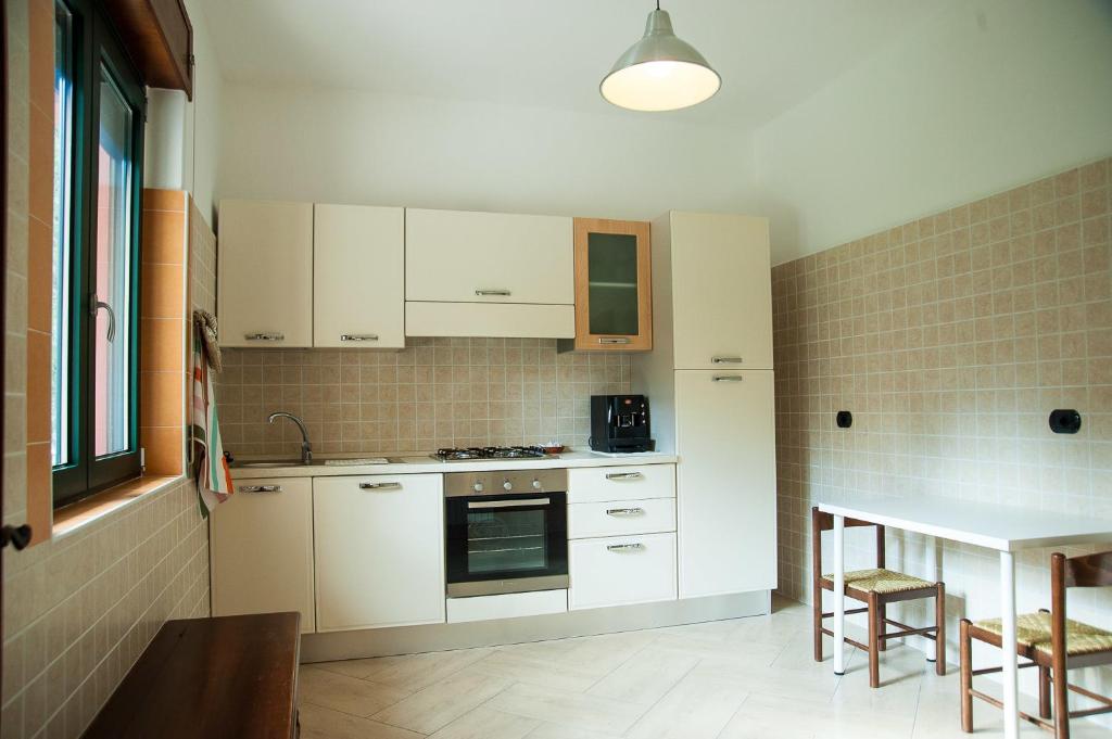 Kuchyň nebo kuchyňský kout v ubytování B&B La Cannalia