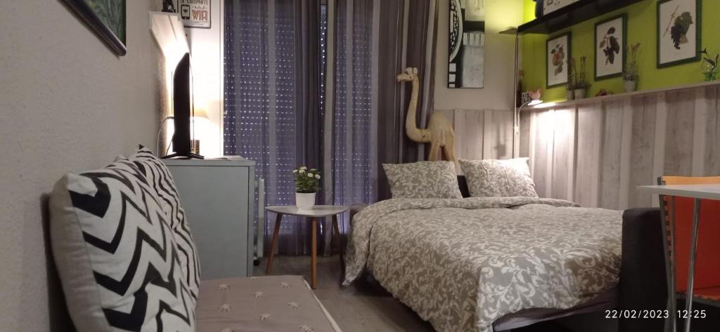 Posteľ alebo postele v izbe v ubytovaní Apartamento Oliver