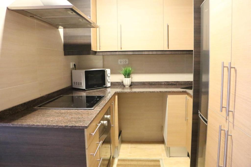 Kuchyňa alebo kuchynka v ubytovaní Apartamento Solêa