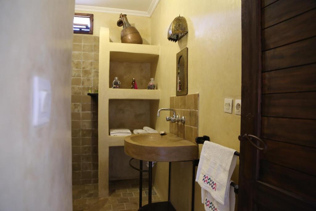 Koupelna v ubytování Dar El Mandar - Ferme & Table d'Hôte Berbère