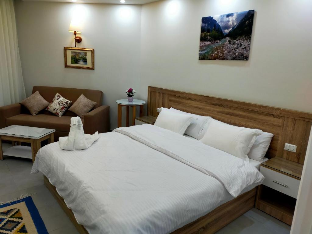 Postel nebo postele na pokoji v ubytování Sweet Home