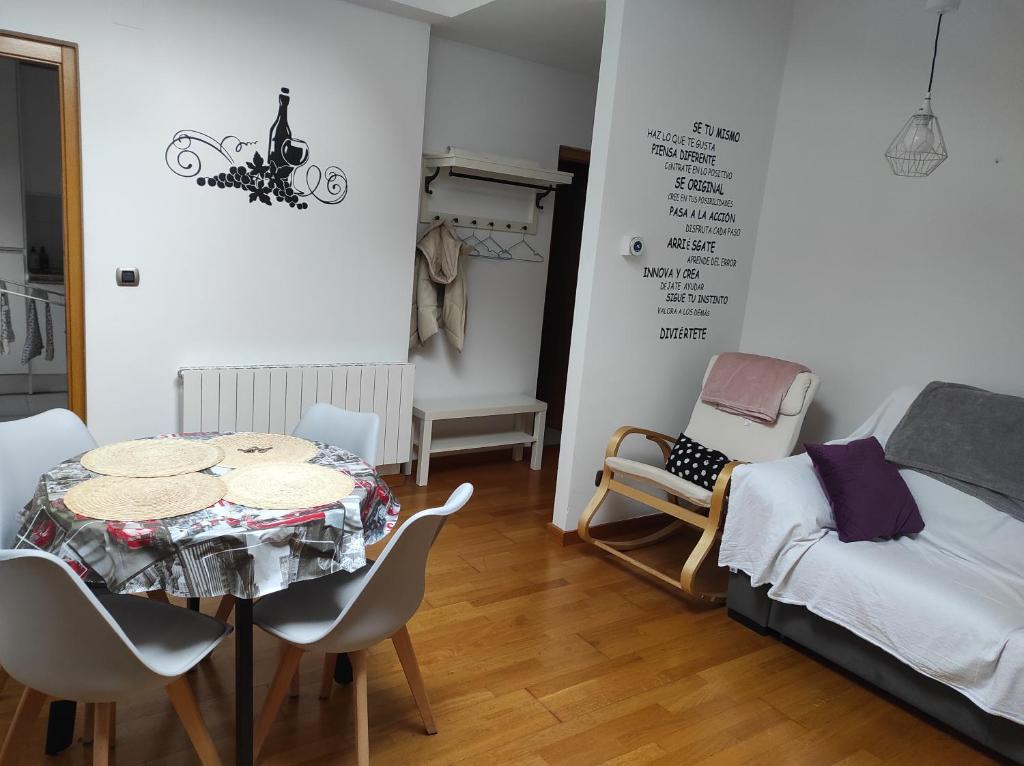 A bed or beds in a room at El Tesoro de Baco