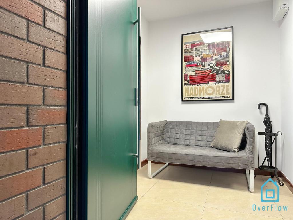 Posedenie v ubytovaní Bałtyk Apartment- Tranquil Retreat, 15 Minutes to the Sea & Gdańsk City Center