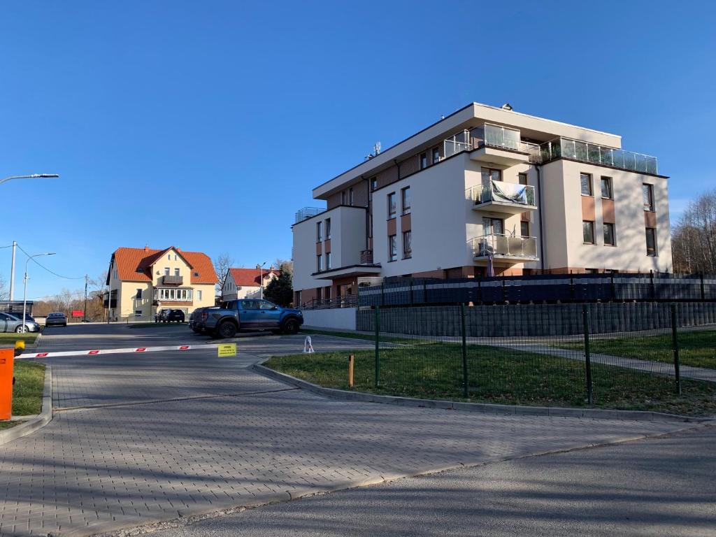 a building on the corner of a street at Apartament Cieplice in Jelenia Góra