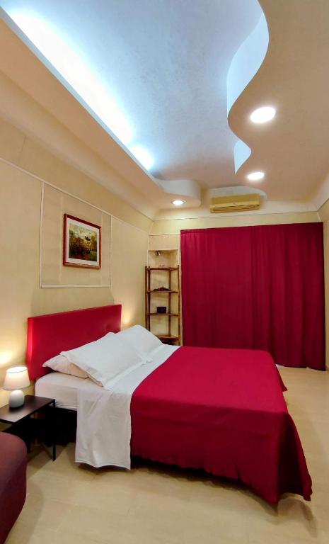 Postel nebo postele na pokoji v ubytování Al Civico Quattro - Studio Flat